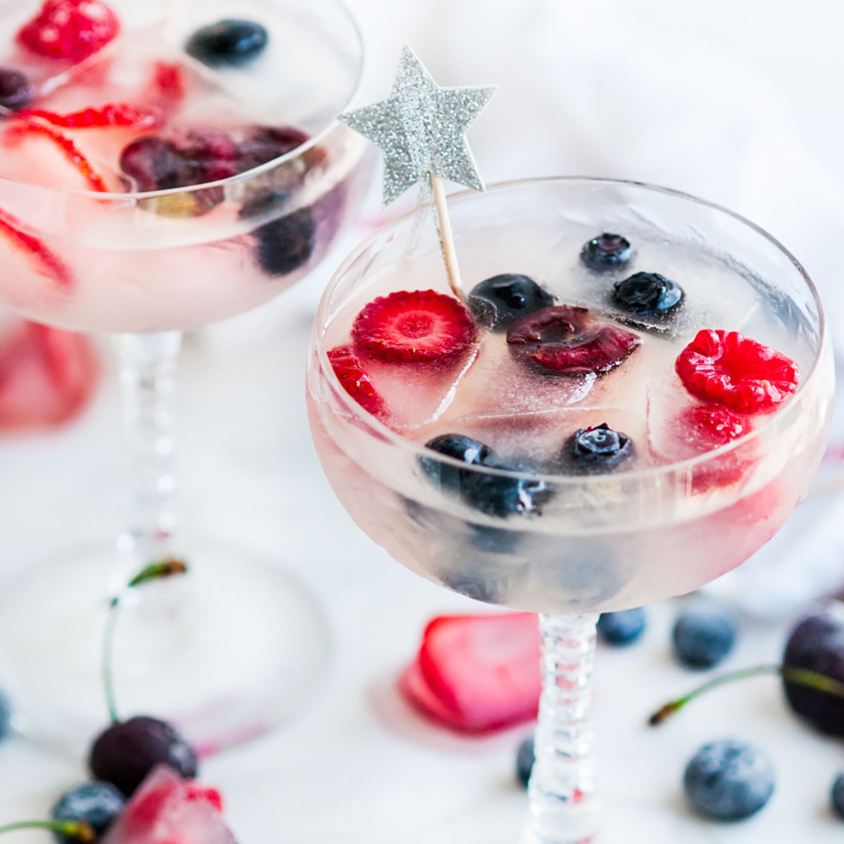 https://www.aberdeenskitchen.com/wp-content/uploads/2017/07/Coconut-Daiquiris-with-Coconut-Water-Berry-Ice-Cubes-7-FI-Thumbnail-1200X1200.jpg
