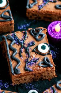 Winifred's Spell Book Hocus Pocus Brownies on black fabric with glittery candles