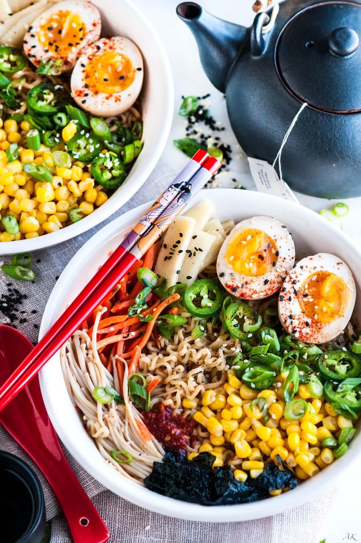 Easy Homemade Ramen with Soft Boiled Eggs in white bowl with chopsticks on marble