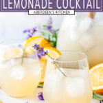 Boozy Lavender Lemonade Cocktail over ice in wine glasses with lavender sprigs and lemon garnish